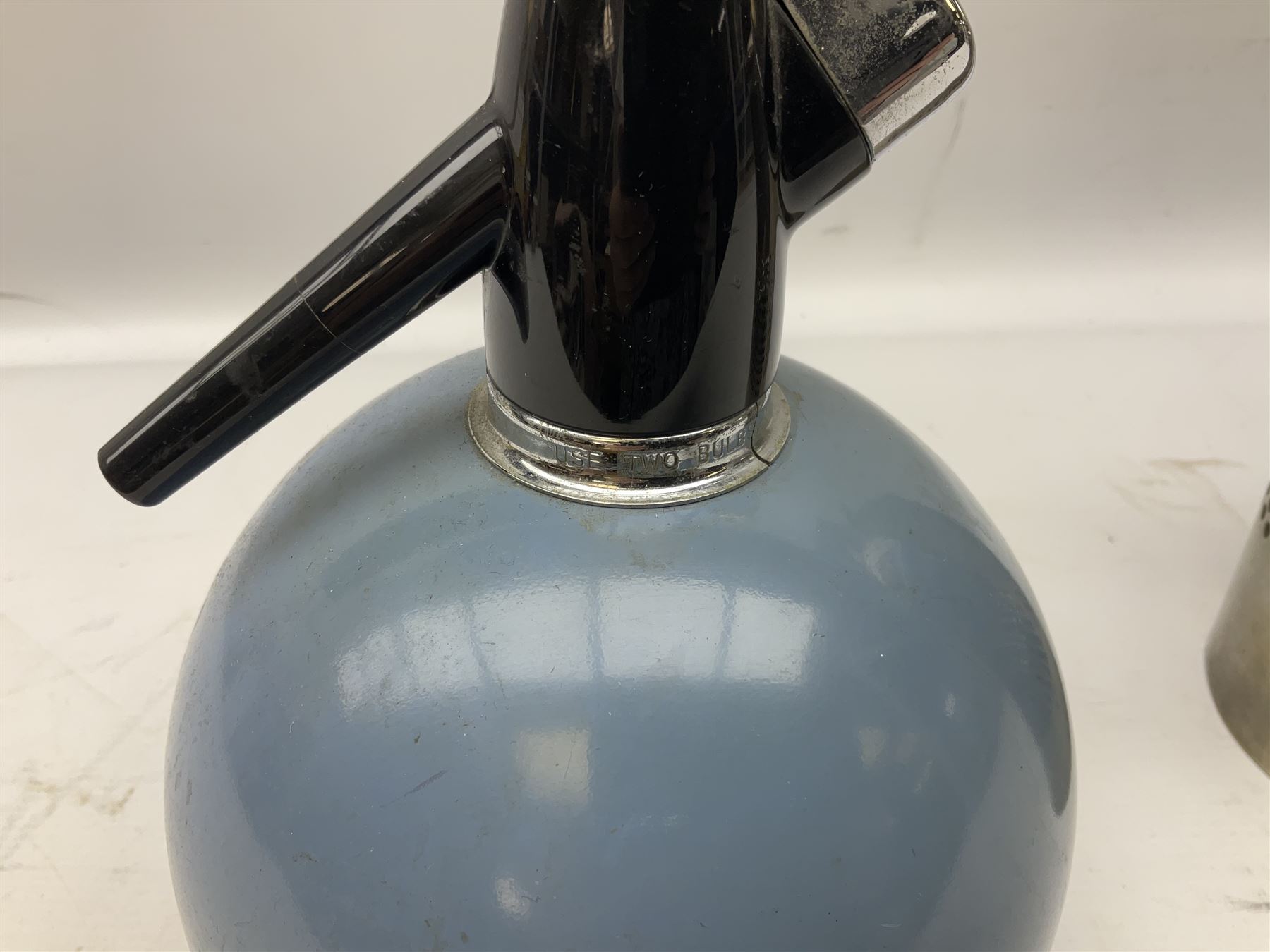 Sparklet 'The Prana' soda siphon charger, together with a Sparklets 'Globemaster' soda siphon in blue, circa 1960-80, tallest H38cm
