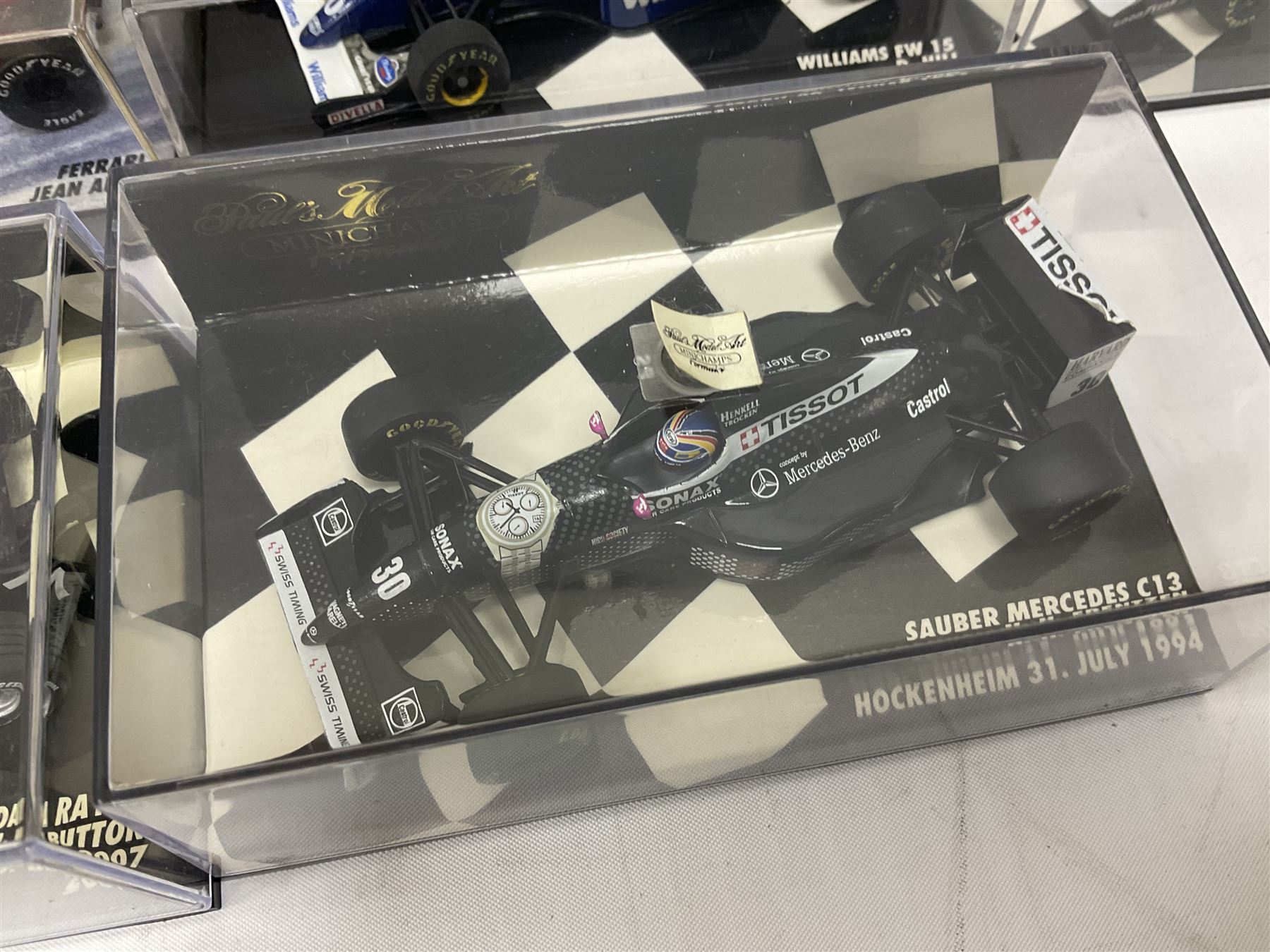 Pauls Model Art Minichamps Formula - ten 1:43 scale die-cast models of racing cars in plastic display cases (10)