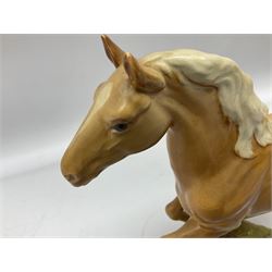 Beswick figure of cantering Palomino horse on base model no 1374, with impressed and printed mark beneath, H18cm