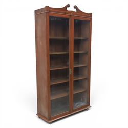 Edwardian walnut bookcase, fitted with two full height glazed doors, inlaid detail with ch...