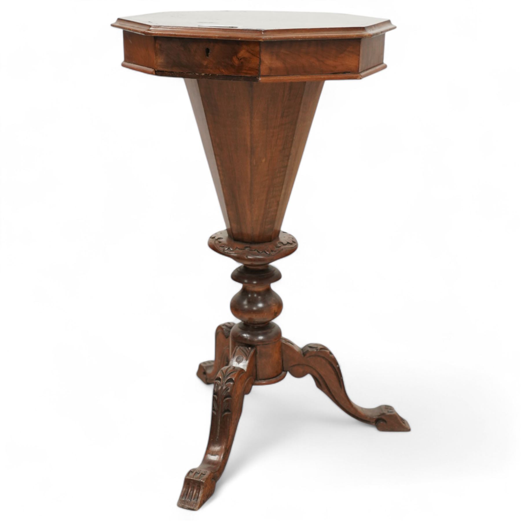 Victorian mahogany trumpet sewing or work table, moulded octagonal hinged lid with parquetry inlaid band, with fitted interior, on turned and foliage carved pedestal with three out-splayed supports 
