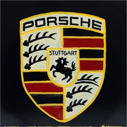 Metal petrol can in the style of Porsche, with black painted body, hand-painted Porsche logo detailing and gilt screw lid