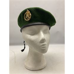 Four paratrooper berets - Russian, Italian, British and Foreign Legion; all with badges (4)