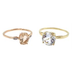 Gold single stone round aquamarine ring and a rose gold three stone morganite and diamond ring, both hallmarked 9ct
