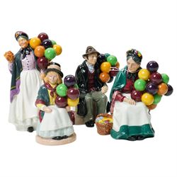 Royal Doulton figures comprising The Old Balloon Seller HN1315, The Balloon Man HN1954, Bi...