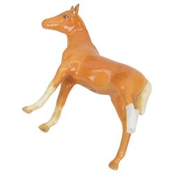 Group of Beswick horse and donkey figures, including Connoisseur Model Mill Reef, Shetland Pony no. 1034 and Bois Roussell no. 701