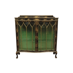  Early 20th century Chinoiserie lacquered display cabinet, serpentine gadroon moulded top above astragal glazed doors, cabriole legs with claw and ball feet, W121cm, H128cm, D39cm  