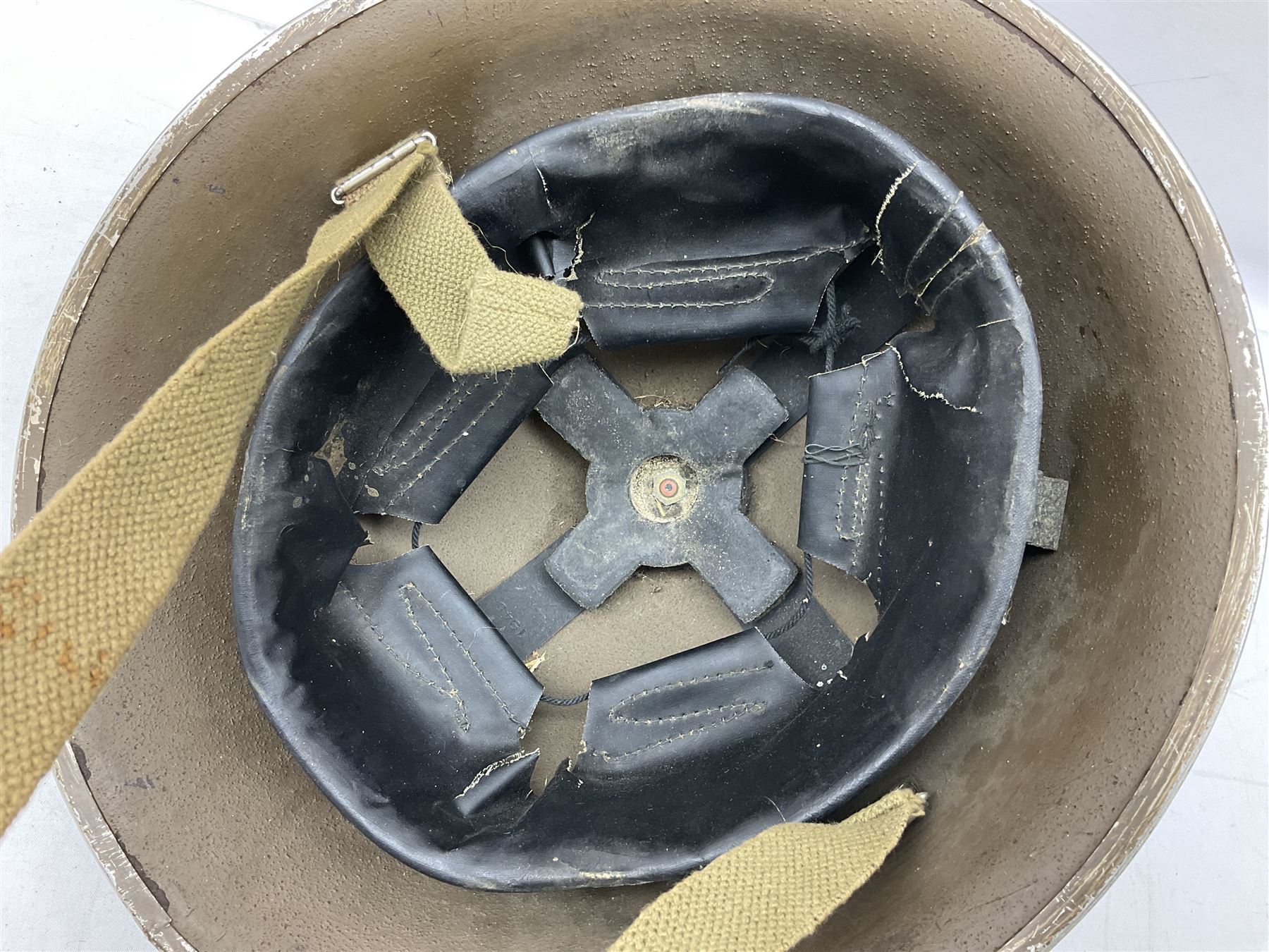 WW2 British Mk III steel combat helmet with textured finish and original liner