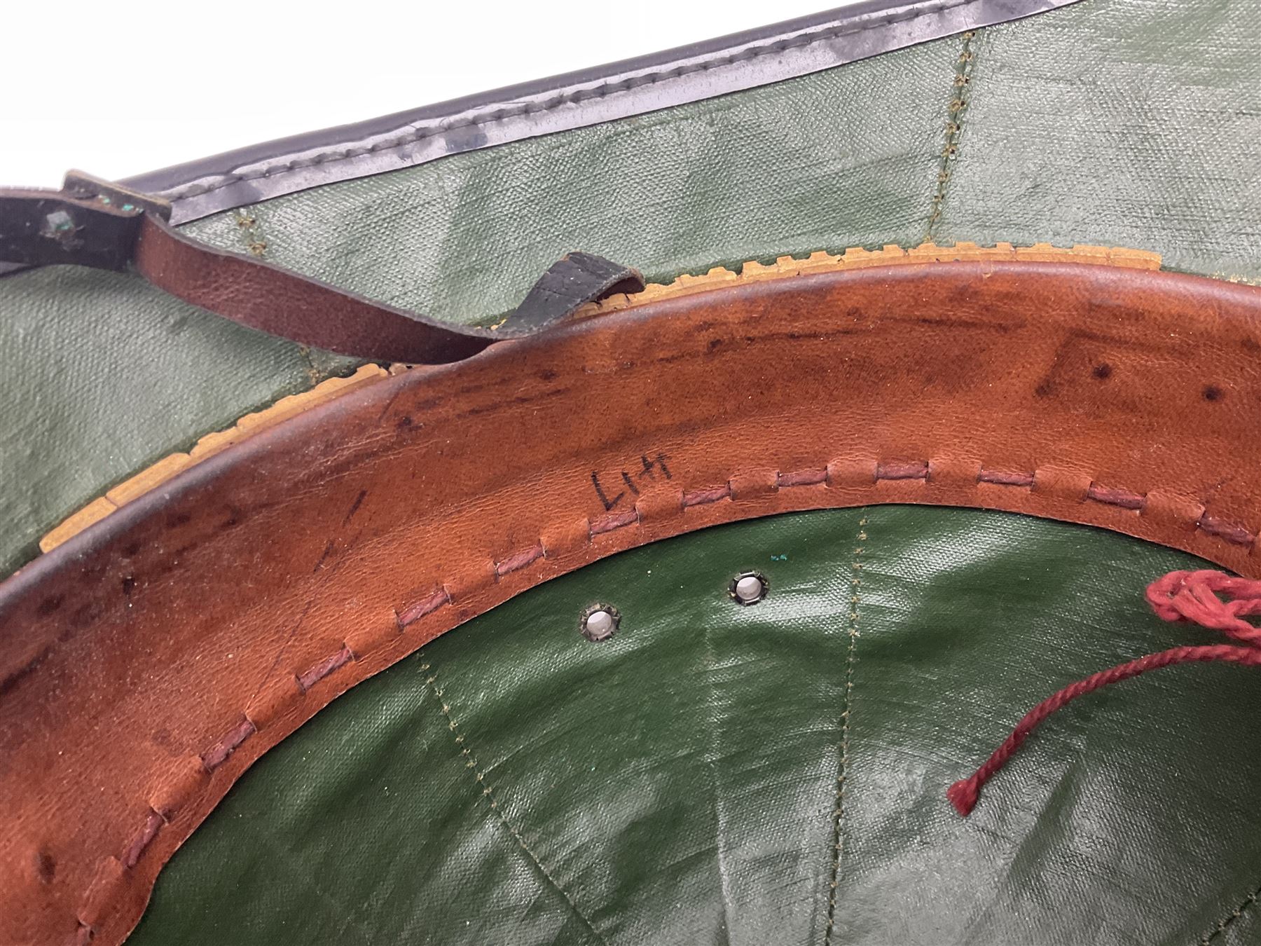 Police - Victorian turned hardwood truncheon with traces of decoration and VR cypher L42cm; Humberside Police helmet with Queens Crown helmet plate; hand lamp inscribed 'The Inspector'; and small pair of pewter figures of police officers (5)