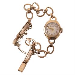 9ct gold cased ladies Helvetia wristwatch on 9ct gold bracelet, together with a 9ct gold bow brooch, hallmarked with a gold plated locket pendant