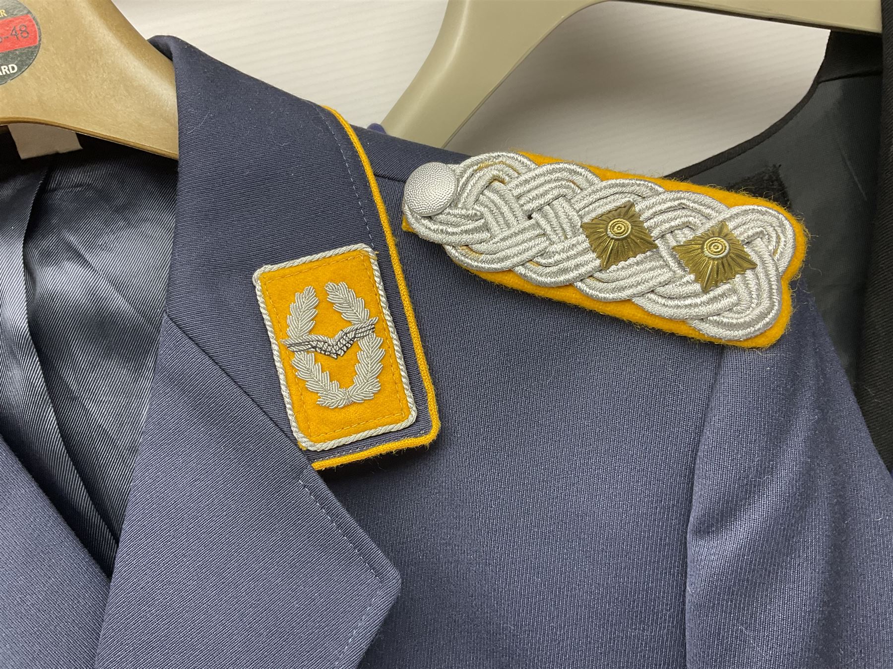 Five military uniforms comprising German Wachbataillon tunic, RASC No.2 dress tunic dated 1963, RAF tunic and trousers dated 1974, RE No.1 tunic and RN Seamans jumper Class II (5)