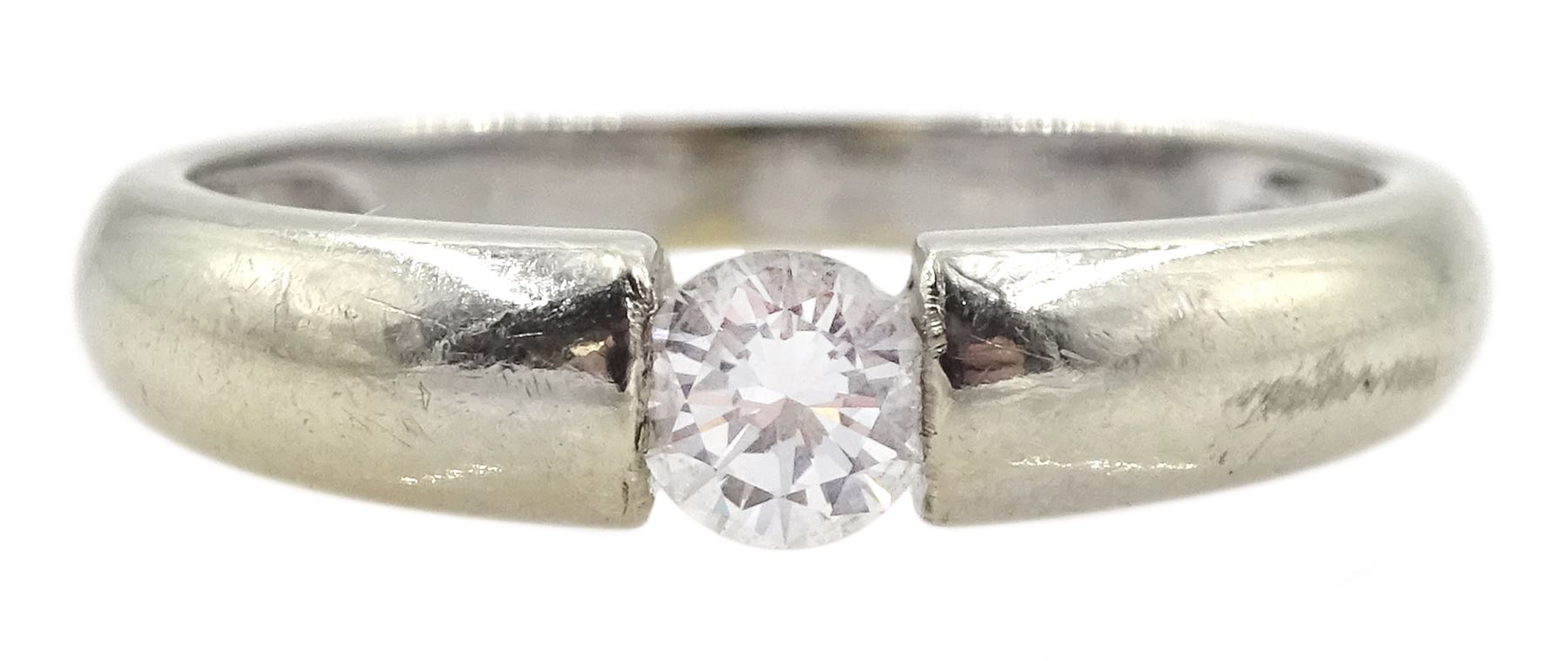 14ct white gold tension set single stone round brilliant cut diamond ring, diamond weight approx 0.20 carat