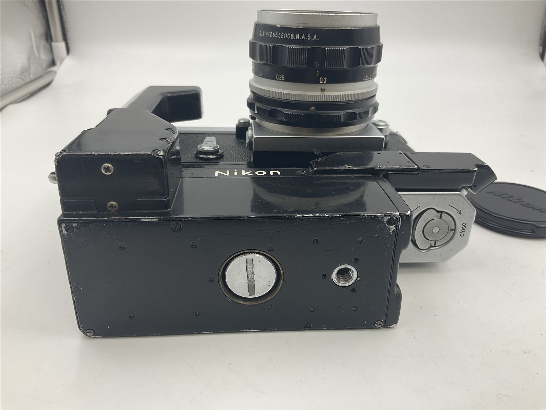 Nikon F NKJ plain prism camera body, serial no. 6520477, with 'Nikon NIKKOR-S Auto 1:2.8 f=35mm' lens, serial no. 344731, Nikon F36 Motor Drive NKJ, serial no. 122780 and Nikon cordless battery pack