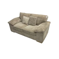Two seater sofa bed, upholstered in latte cord fabric