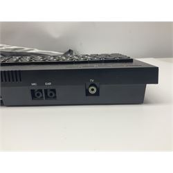 Sinclair ZX Spectrum (1984) with accessories and games; ten games for Sinclair Spectrum and 48K Spectrum to include ‘Knight Lore’, ‘The Way of the Exploding Fist’, and ‘Green Beret’ all in original boxes, ‘Rambo First Blood Part II’ without original box; Sinclair UK1400 Power Supply Unit, Hales Universal Mains Adapter, RAM Turbo Spectrum Joystick Interface, Starlite Cassette Player, all without boxes