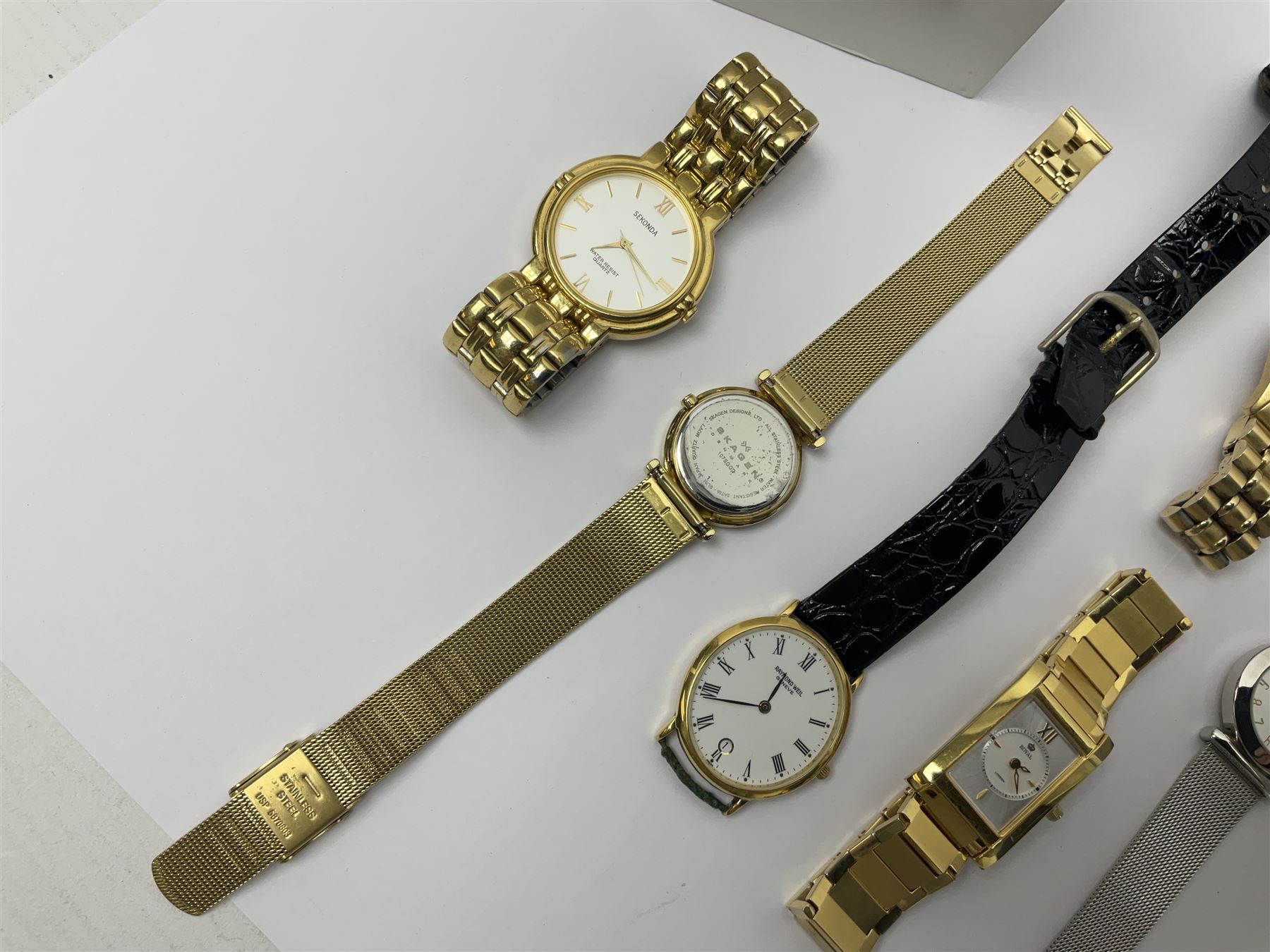 Two ladies Skagen wristwatches, to include 107SGSC and 107SGGD, both on stainless steel mesh straps, boxed, together with four other ladies wristwatches (6)