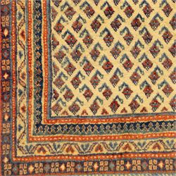 North West Persian Arak hand-knotted carpet, ivory ground densely decorated with an all-over diagonal boteh lattice design within a madder red main border of stylized rosettes and botehs between multiple narrow floral guard stripes