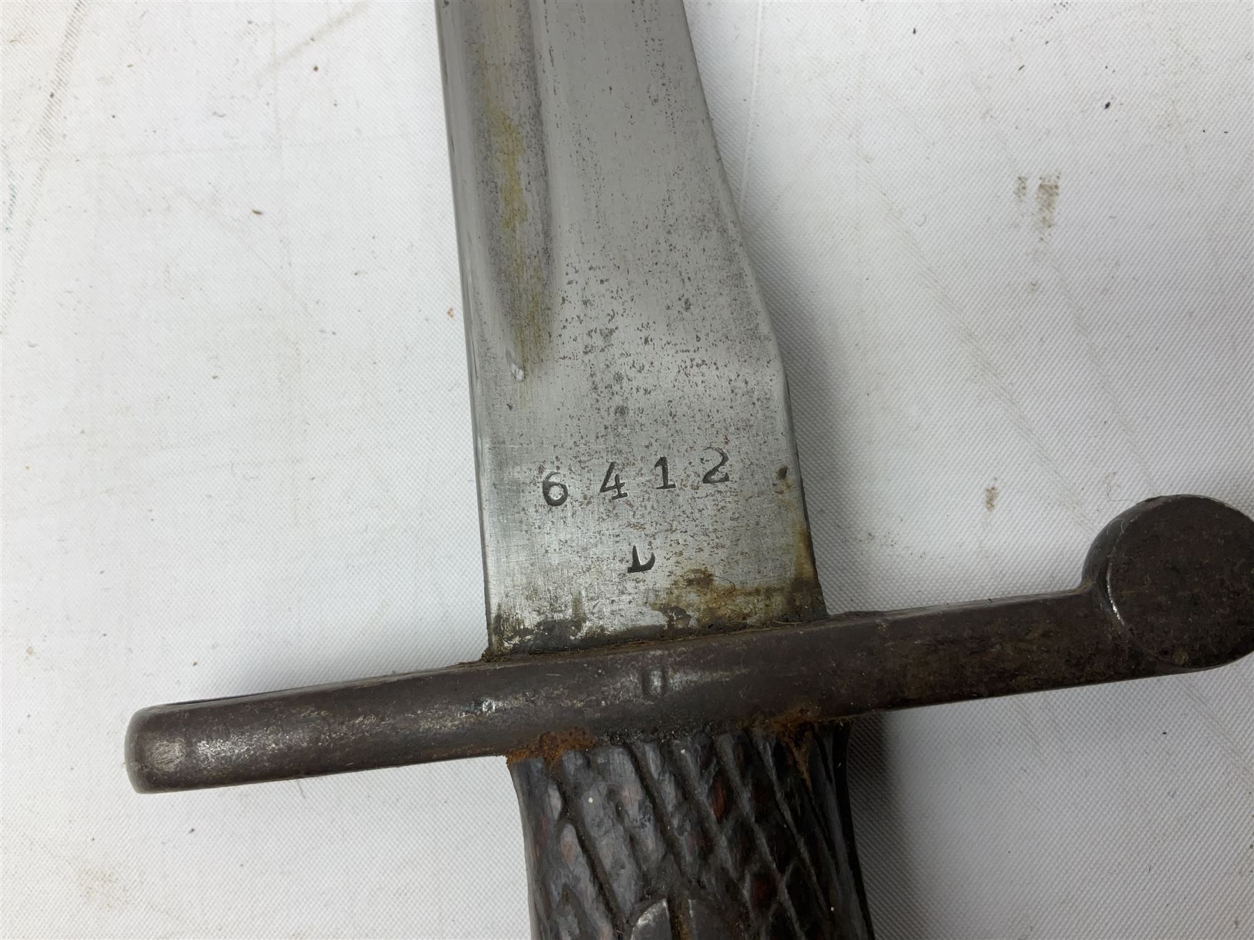 Austrian Model 1895 carbine NCO's knife bayonet with 25cm fullered steel blade; in steel scabbard with webbing frog L39cm overall; and Spanish Model 1941 Bolo bayonet with 25cm fullered steel blade No.6412D; in steel scabbard (2)