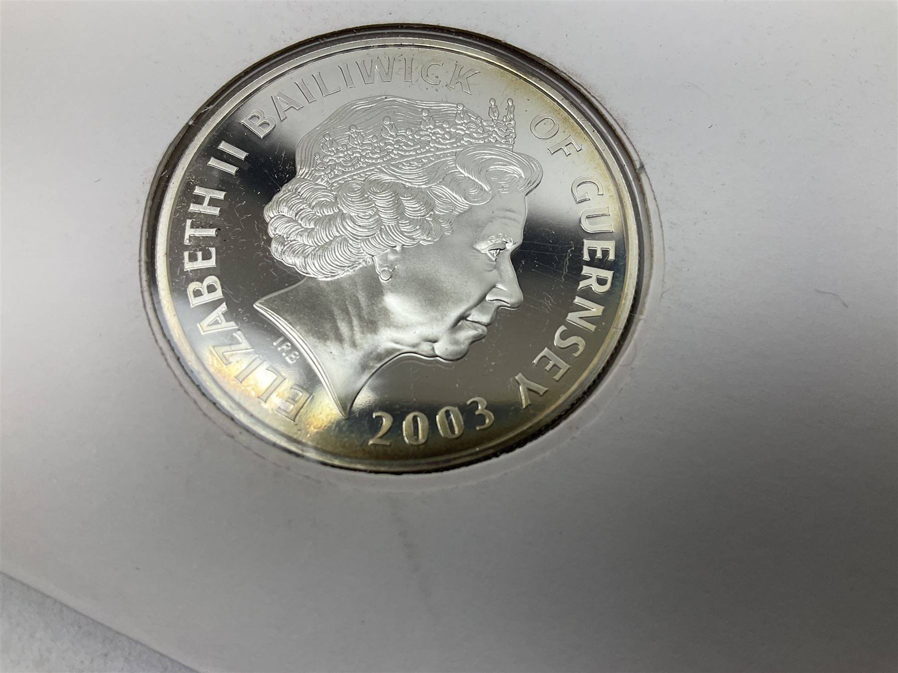 Eight coin covers including, 'Her Majesty Queen Elizabeth II 70th Birthday' containing a 1996 Canadian one ounce silver coin, three coin covers commemorating the 21st Birthday of HRH Prince William each containing a silver coin, '1895 1952 A Tribute to HM King George VI' containing a South Africa 1952 five shilling coin, 'The Notting Hill Carnival' containing a 1998 fifty pence etc (8)