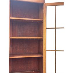 Late 19th century mahogany bookcase on chest, projecting moulded cornice over twin astragal glazed doors enclosing three shelves, base fitted with three graduated drawers, raised on shaped bracket supports