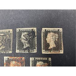 Seven Great Britain Queen Victoria penny black stamps, three with black and four with red MX cancels