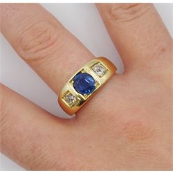 Late 19th century continental gypsy set three stone oval sapphire and old cut diamond ring, stamped 18ct, makers mark HA, total diamond weight approx 0.45 carat, sapphire approx 1.05 carat