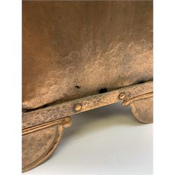 Early 20th century Arts and Crafts planished copper coal box and cover, of tapering form with twin ring handles, upon four shaped feet, the cover with knop finial lifting to reveal removable liner, H63cm