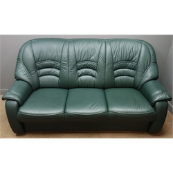  Four piece lounge suite three seat sofa (W202cm, H106cm, D90cm) pair of matching armchairs, (W95cm, H106cm, D87cm), and a footstool (W40cm, H46cm, D40cm), upholstered in green leather  