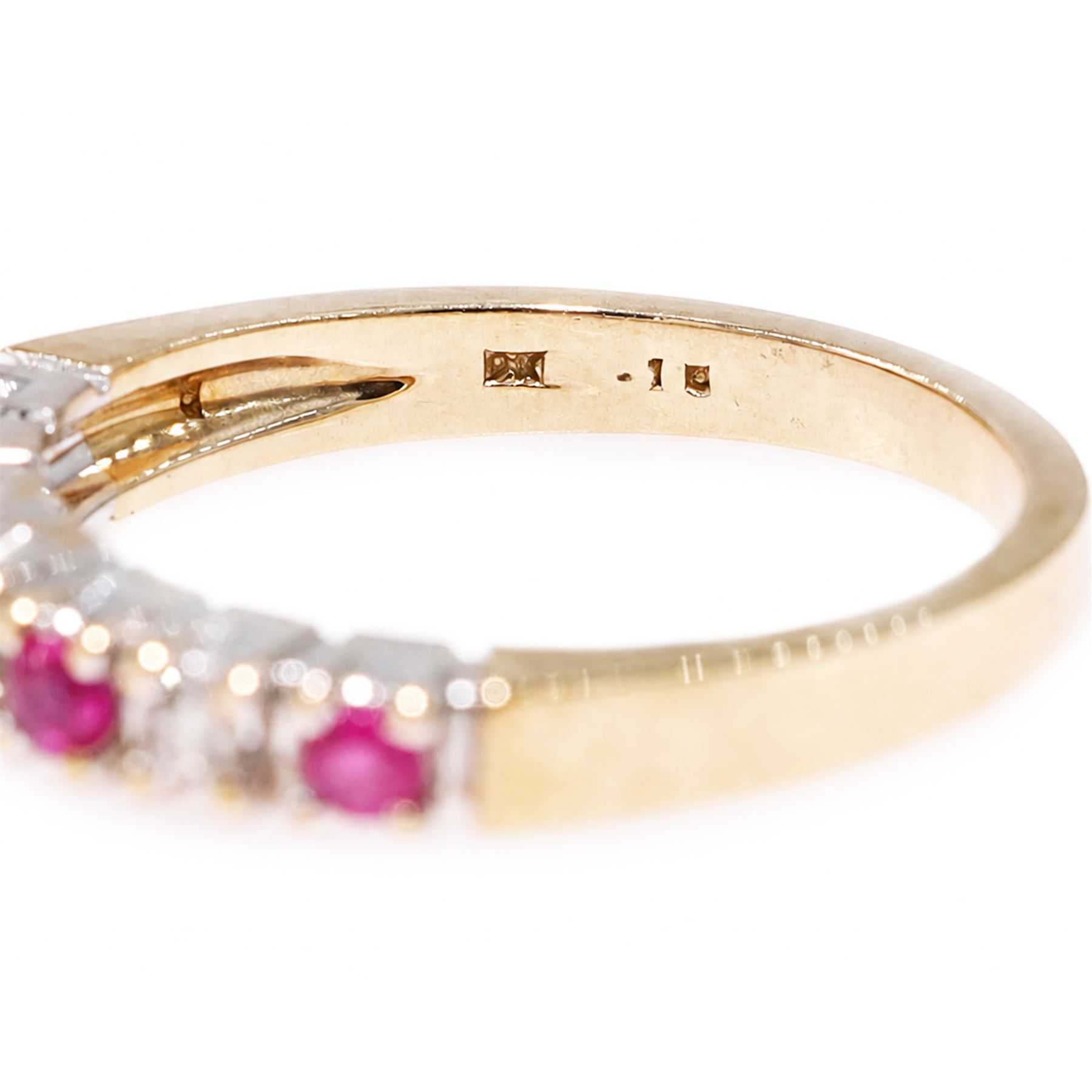 9ct gold ruby and diamond seven stone half eternity ring, alternate set with round brilliant cut diamonds and rubies, hallmarked, total diamond weight 0.15 carat