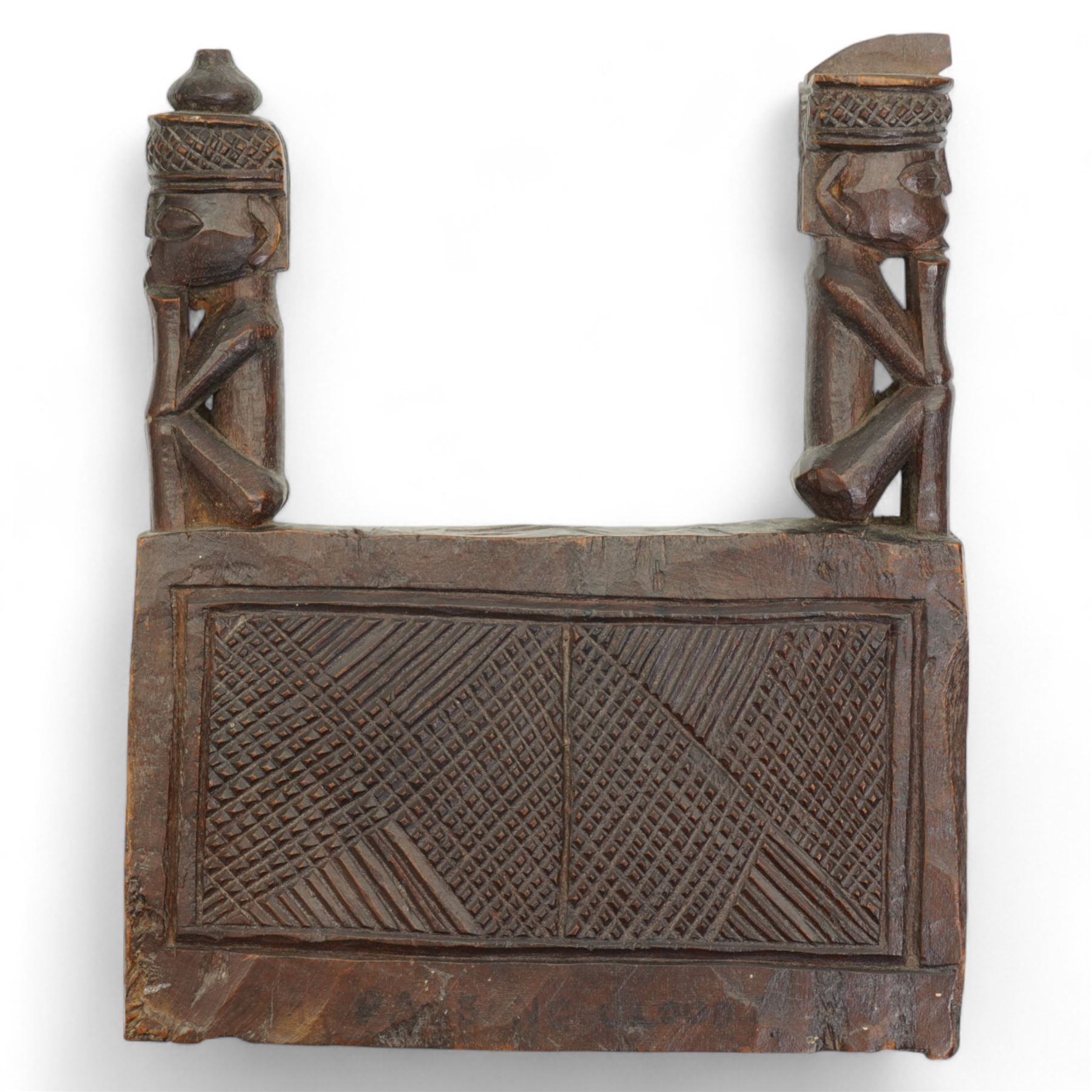 Australian Aboriginal boomerang decorated with eucalyptus leaves, a plain boomerang,  African wood and iron lamellophone and a carved wood tablet with two figures