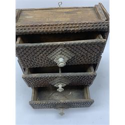19th century Tramp art three drawer chest with typical chip carved decoration and metal handles, H34.5cm, W30cm, D17cm