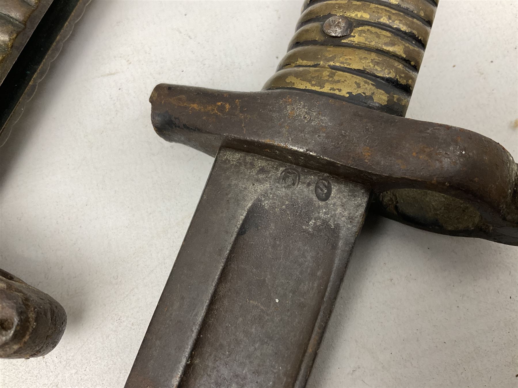 Five 19th century bayonets in relic condition without scabbards comprising British Pattern 1876 socket bayonet with Indian markings; French Model 1874 epee bayonet; and three French Model 1866 sabre bayonets (5)