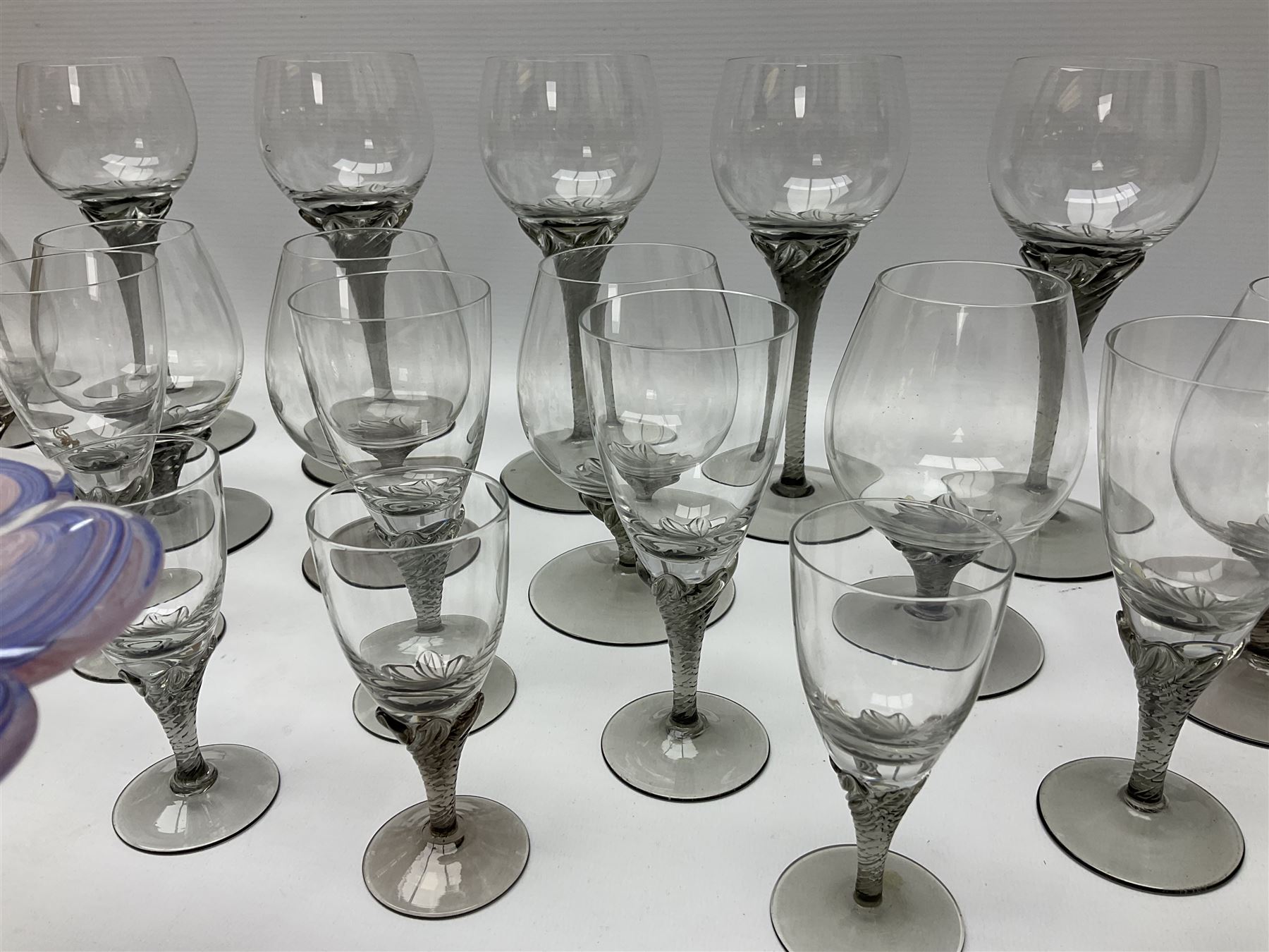 Murano glass figure of a recumbent horse, Murano Lavorazione purple and pink flower, and quantity of matching drinking glasses