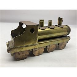 Trench Art - WWI 0-8-0 steam locomotive made from brass, copper and late Victorian pennies and half-pennies L17.5cm; WWI brass and copper tank candleholder; WWI brass shell case two-handled vase inscribed 'RFA France 1914-17'; and an unrelated brass plant holder (4)