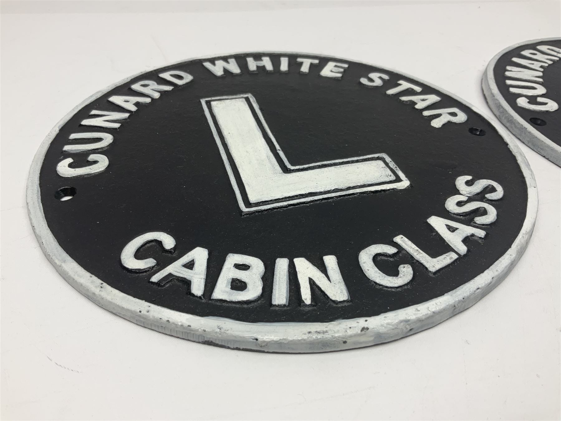 Pair of reproduction cast iron Cunard White Star signs, D25cm 