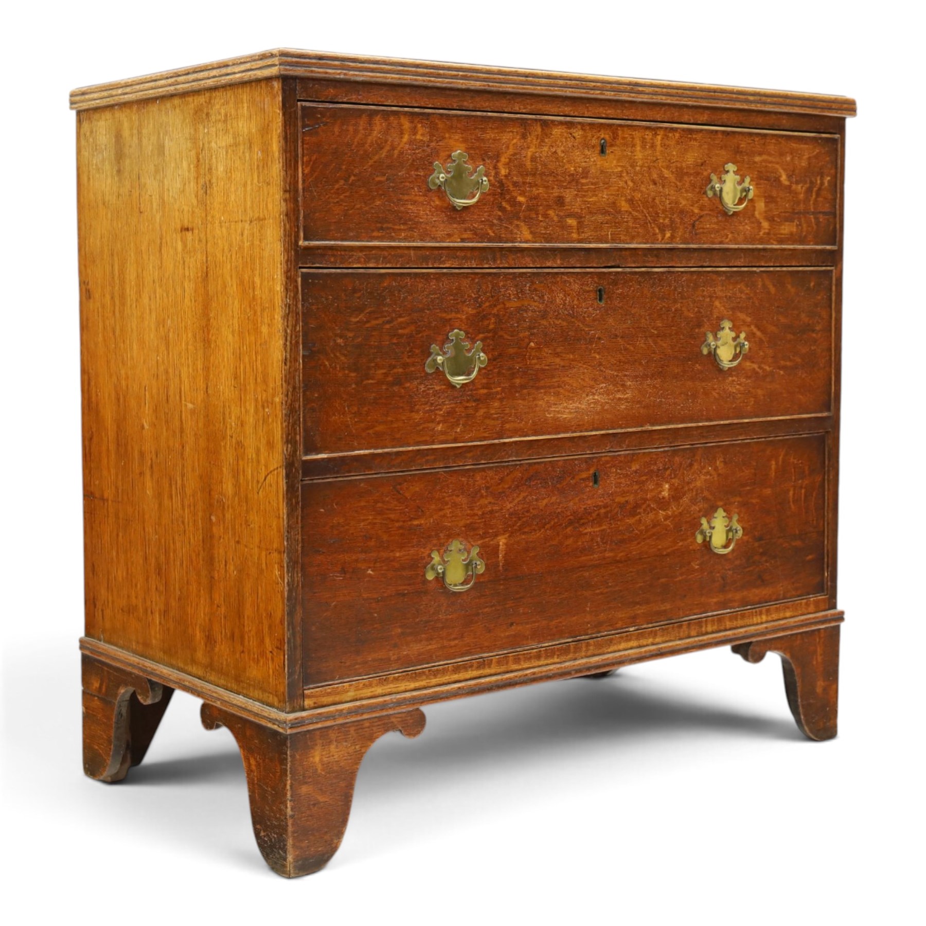 18th century oak straight-front chest, rectangular caddy-top with reeded edge, fitted with three graduating cock-beaded drawers, raised on bracket feet