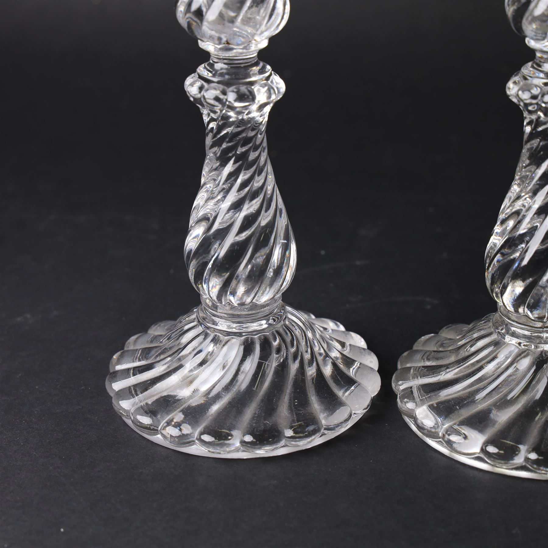 Pair of Baccarat Bambous glass candlesticks, with wrythen moulding, marked beneath, H19cm