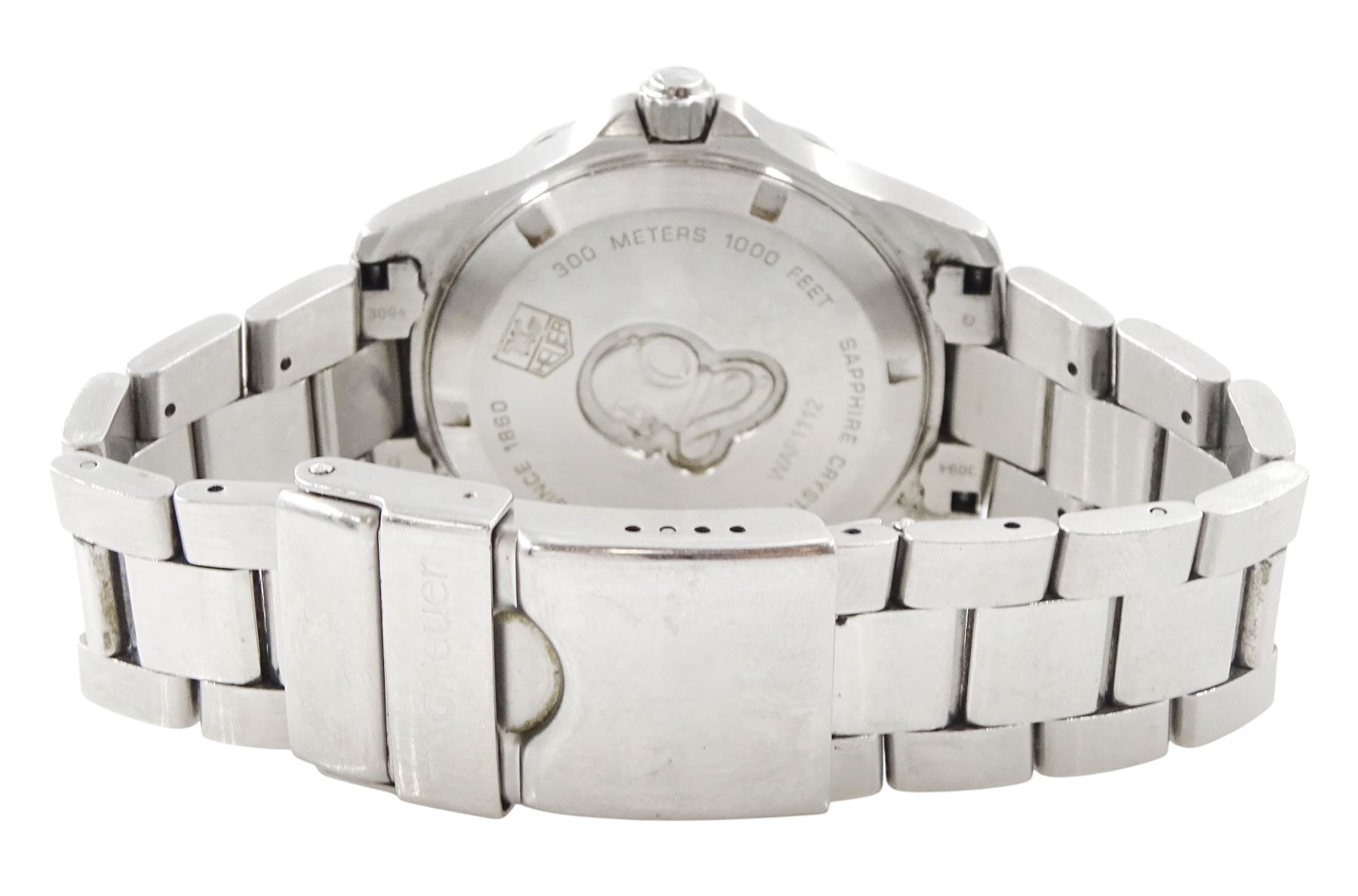 Tag Heuer Aquaracer 300 meters gentleman's stainless steel quartz wristwatch, Ref. WAF112, silvered dial with dagger hour markers and date aperture, on original stainless steel bracelet , with fold-over clasp, boxed with additional links and guarantee card dated 2007