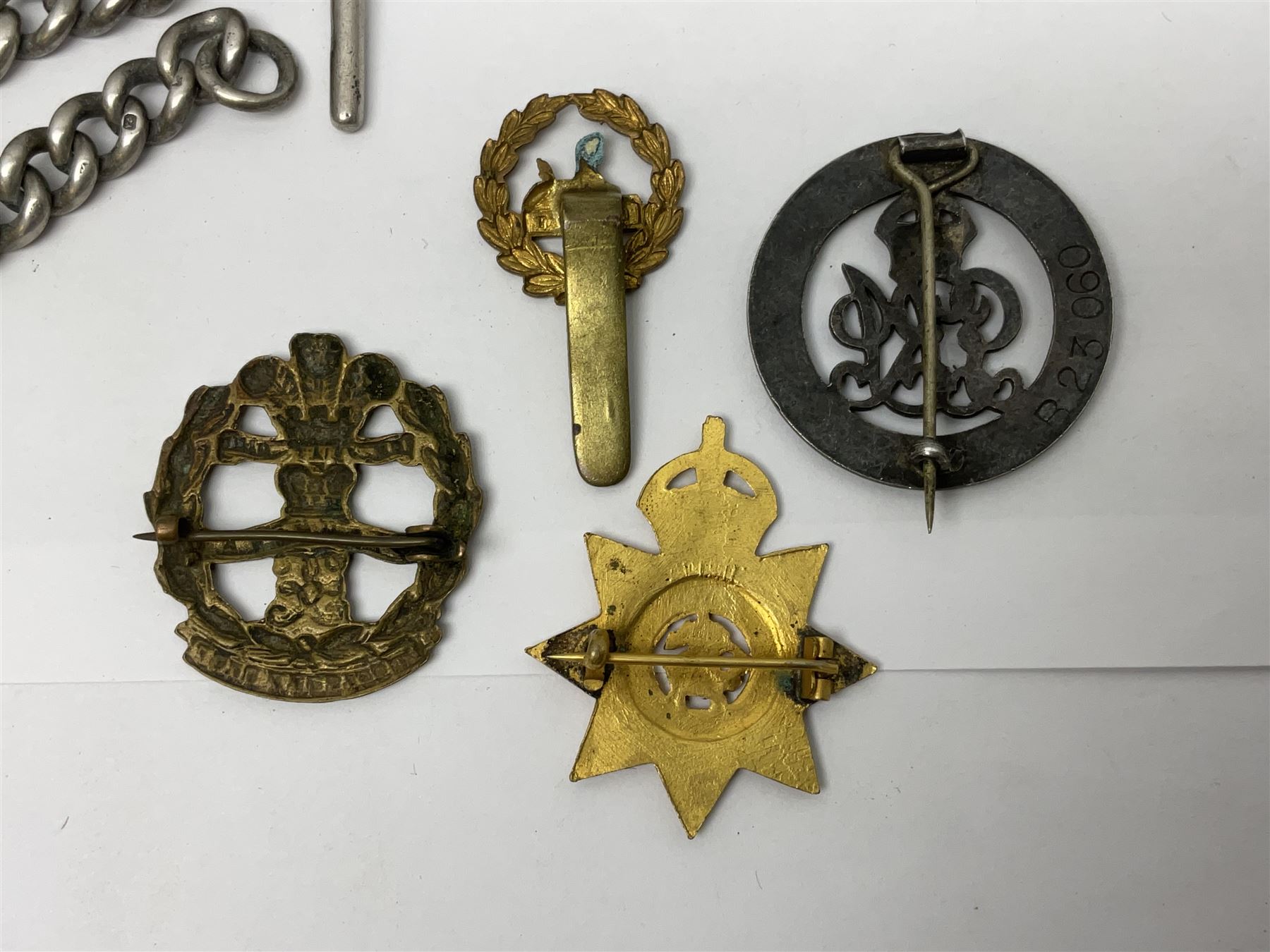 Two Services Rendered badges Nos.B23060 and B201341; two MSO BAOR (Mixed Services Organisation British Army of the Rhine) badges; small quantity of shoulder titles, lapel/sweetheart brooches, buttons and non-military related items