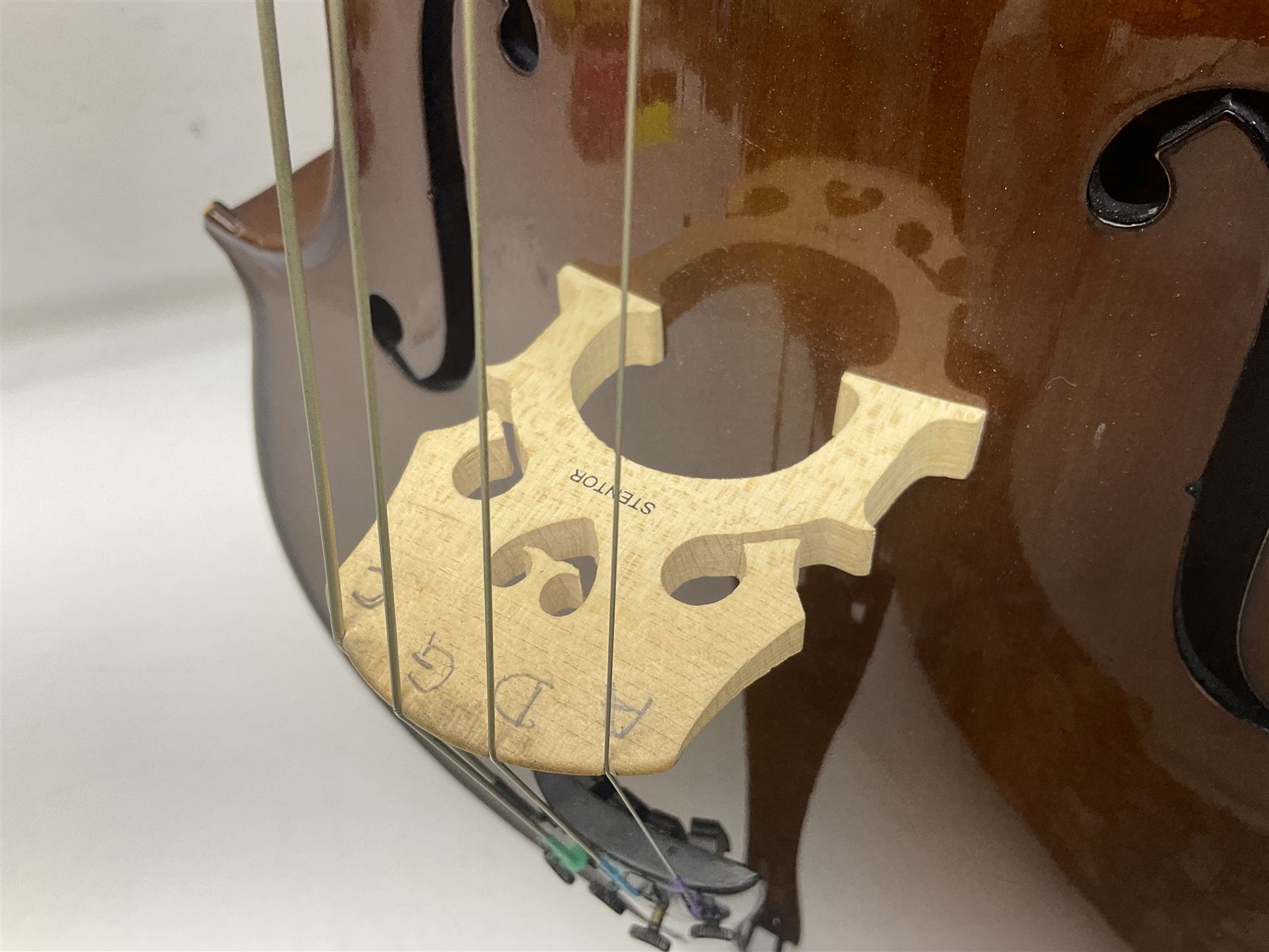 Stentor Student I quarter-size cello with 59.5cm two-piece maple back and ribs and spruce top; bears maker's label with serial no.M072648 L95.5cm overall; in Stentor soft carrying case with bow