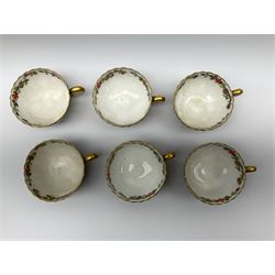 19th century Copeland Spode tea wares, comprising milk jug, and six teacups and six saucers, each decorated with floral panels within a dark blue surround and heighted with gilt, with pattern no 3803 beneath. 
