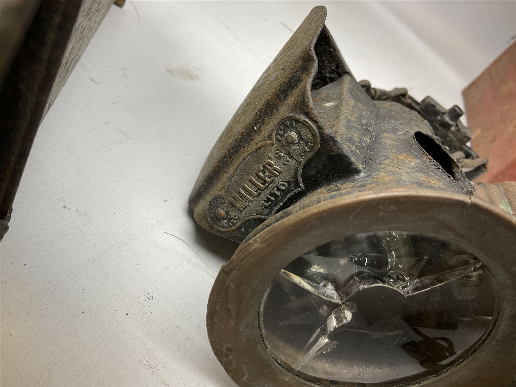 Collection of cast iron lamps, predominantly railway and coach examples, to include John Phillips Light of London Lamp Co coach lamp and Lito bicycle lamp by Miller & Co of Birmingham, etc