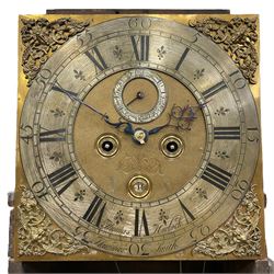 William & Mary floral marquetry 8-day longcase clock c 1700, later mid-18th century four pillar rack striking movement with a square brass dial and subsidiary seconds dial, ringed winding holes and calendar aperture to the matted dial centre, with London cherub head cast spandrels and (later) fretted steel hands, silvered Roman numeral chapter ring with stylised fleur di Lis half hour makers, narrow Arabic five-minutes, minute track and inner quarter hour track, signed Thomas Horlock, Hammersmith, 
case with box upstand to the domed floral marquetry decorated caddy with three brass flame finials, above a moulded cornice and fretwork frieze,  inlaid hood door with attached barley twist pillars to the front above an inlaid convex moulding, full length D moulded trunk door with a circular lenticle inlaid with floral and foliage panels inhabited with birds, on a conforming marquetry plinth with applied double skirting. Thomas Horlock is recorded as a Whitesmith & Clockmaker of Hammersmith, Middlesex.
A copy of Thomas Horlock's will dated the 15th June 1757 is held at The National  Archives Kew.