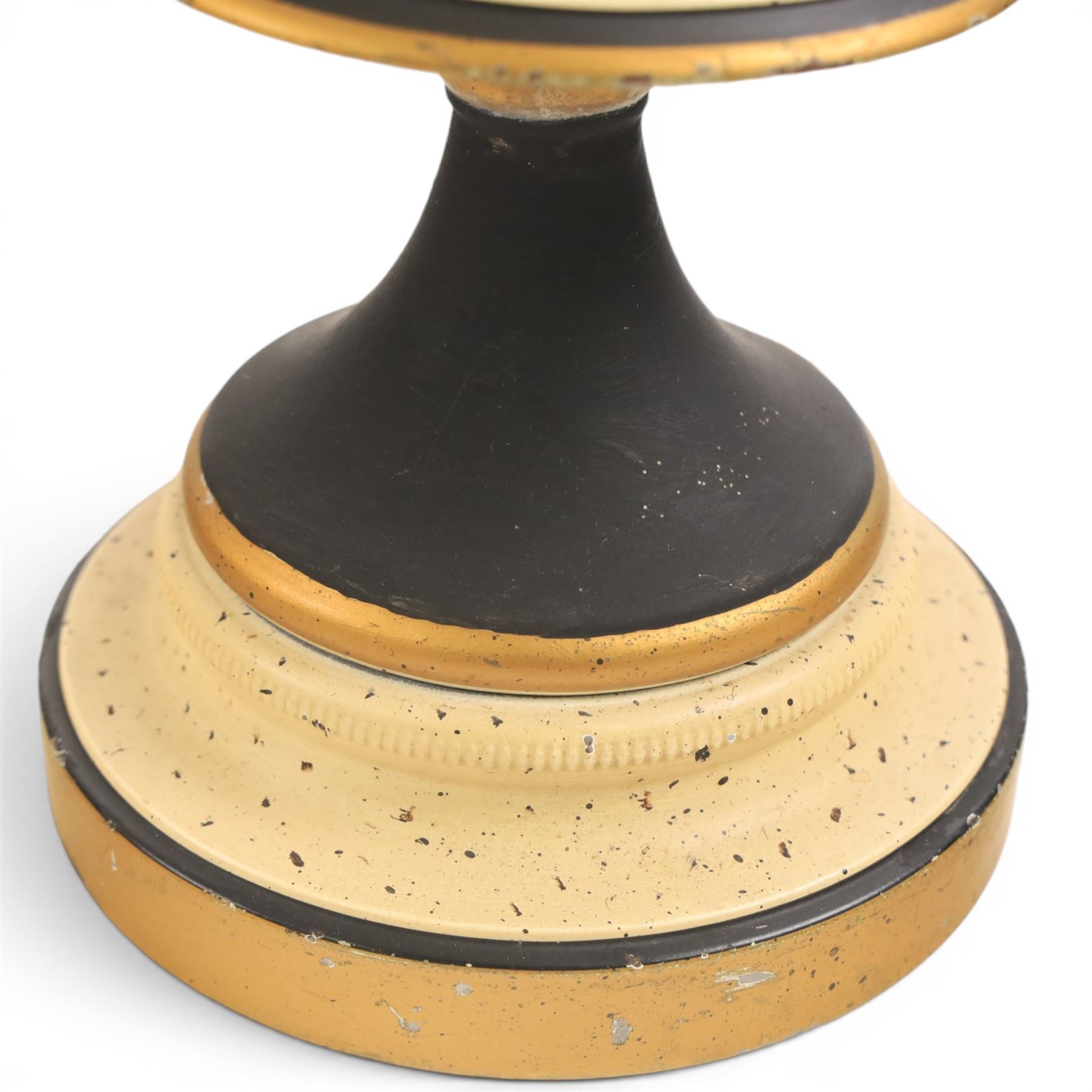 Pair of table lamps, the central column with gilt and and black bands and a foliate boarder, with cream shades, H58cm without shades 