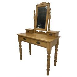 Waxed pine dressing table, raised rectangular swing mirror over small trinket drawers, fitted with two drawers, on turned supports 