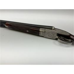 Gunmark Silver Sabel De Luxe 12-bore side by side double barrel side lock ejector sporting gun, 68.5cm barrels with 2.75cm chambers and matt bluing, walnut stock with chequered grip and fore-end and thumb safety, serial nos.12509 & 100.085, L111.5cm overall SHOTGUN CERTIFICATE REQUIRED