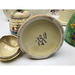 Clarice Cliff for Wilkinson Ltd Crocus Bizarre beehive honeypot painted in the Crocus pattern, together with two beehive Beswick honey pots, Poole square honey pot etc (14)