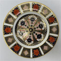 Two Royal Crown Derby Imari plates, pattern no.1128, one with fluted rim, D21cm