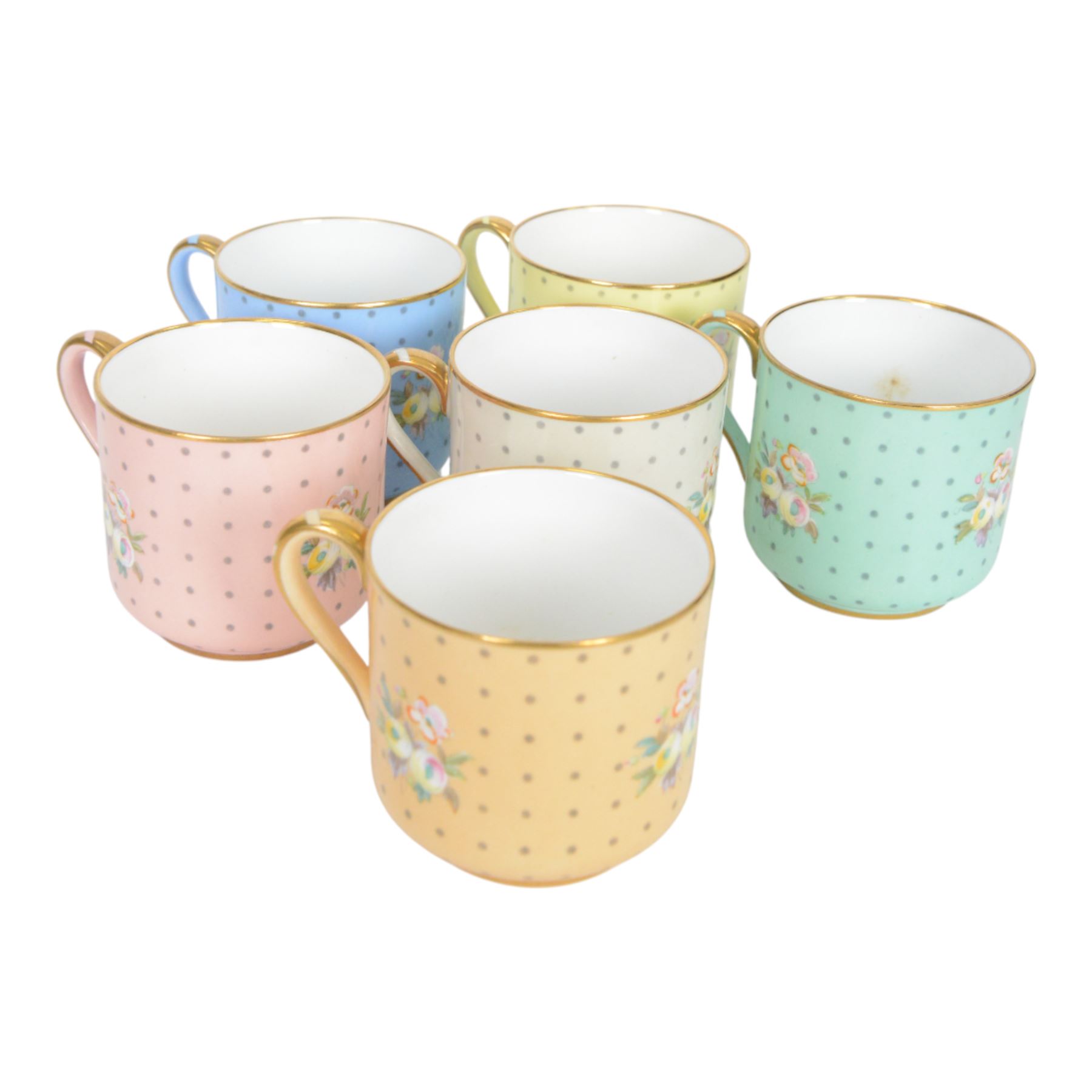 Spode six coffee cups and saucers cased set, decorated with floral sprigs on a polka dot ground with gilt detail