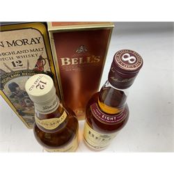 Glen Moray 12 Year Single Malt Highland Scotch Whisky, 70cl 40% vol, one bottle, in Highland Regiments The Black Watch presentation tin, Glenfiddich Pure Malt Scotch Whisky, Special Old Reserve, 70cl 40% vol, one bottle, in Clan Murray presentation tin, Bell's Extra Special Old Scotch Whisky, Aged 8 Years, 70cl 40% vol, one bottle, in box and Bell's Extra Special Old Scotch Whisky, 1l, 43% vol (4)